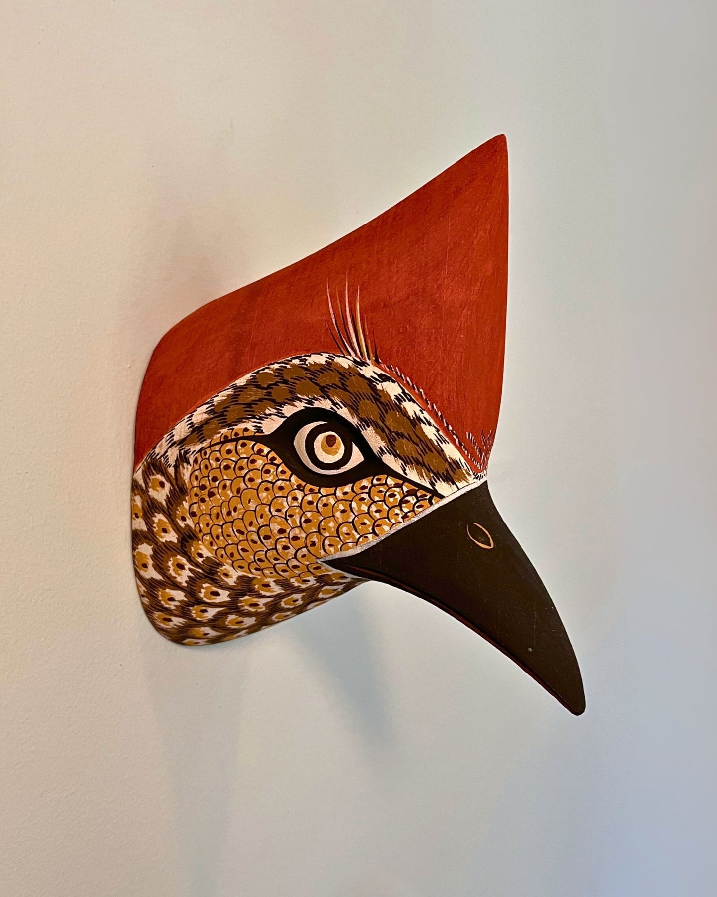 Handmade, hand carved wood, hand painted wooden animal head masks, artifact. One-of-a-kind, unique wall decor, sit-about home décor. Artisan made Chané masks in Argentina. Bird.