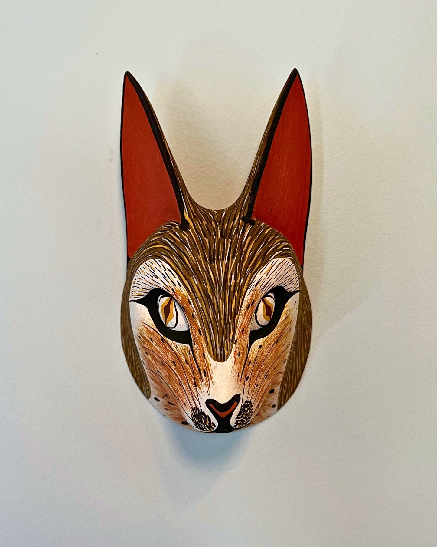 Handmade, hand carved wood, hand painted wooden animal head masks, artifact. One-of-a-kind, unique wall decor, sit-about home décor. Artisan made Chané masks in Argentina. Fox.