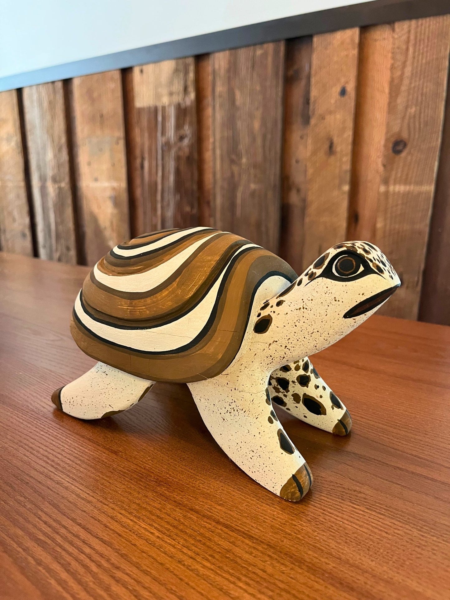 Handmade, hand carved wood, hand painted wooden animal heads. One-of-a-kind, unique tabletop decor, sit-about home décor. Artisan made from Chané artisans in Argentina. Tortoise Sculpture.