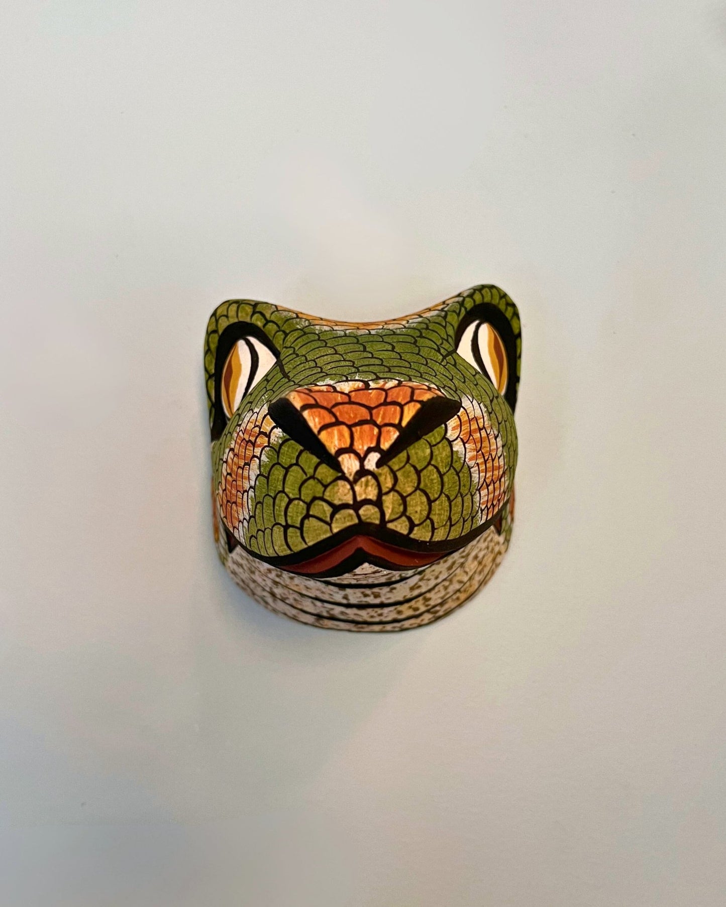 Handmade, hand carved wood, hand painted wooden animal head masks, artifact. One-of-a-kind, unique wall decor, sit-about home décor. Artisan made Chané masks in Argentina. Snake, Lizard.