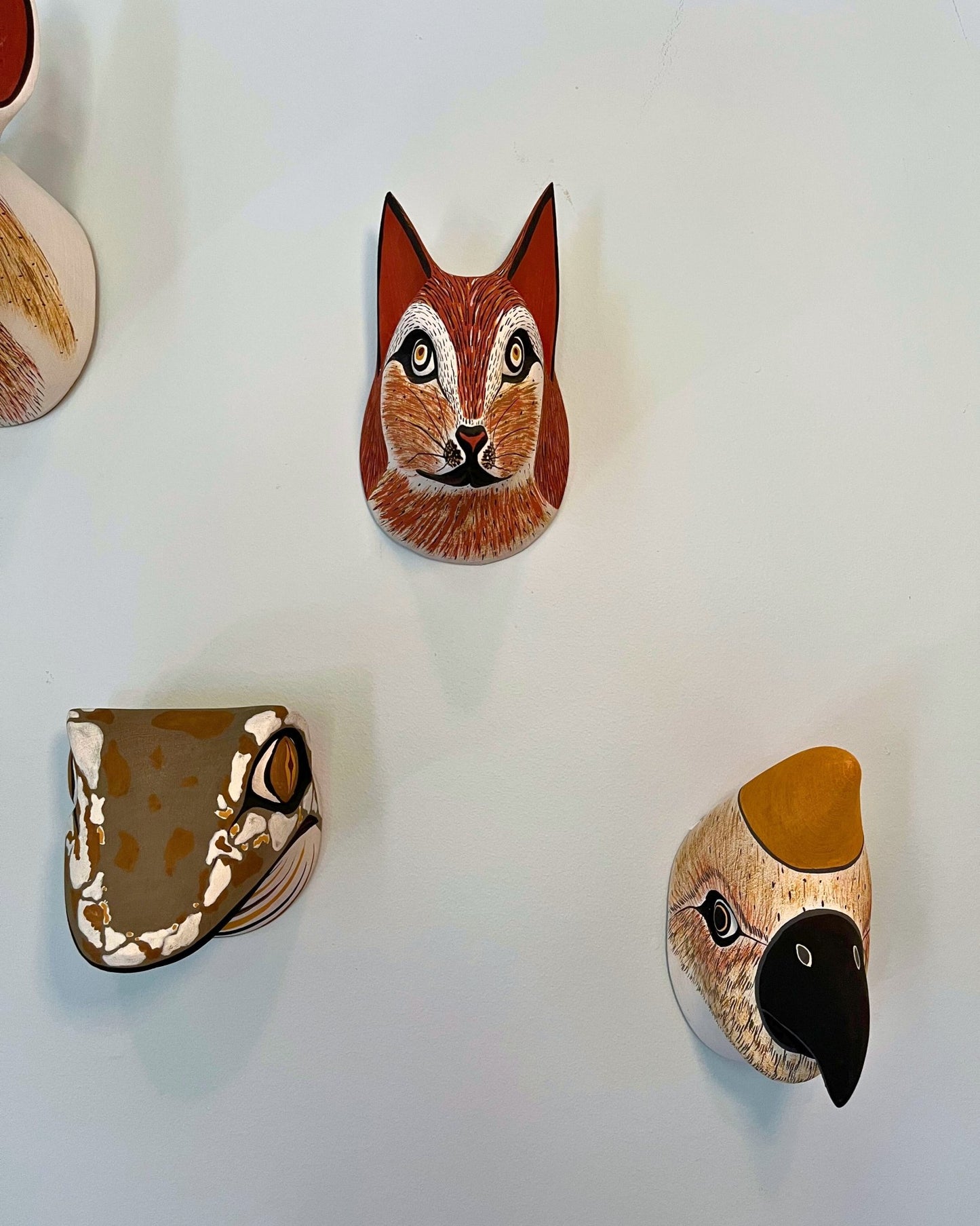 Handmade, hand carved wood, hand painted wooden animal head masks, artifact. One-of-a-kind, unique wall decor, sit-about home décor. Artisan made Chané masks in Argentina. Toad.