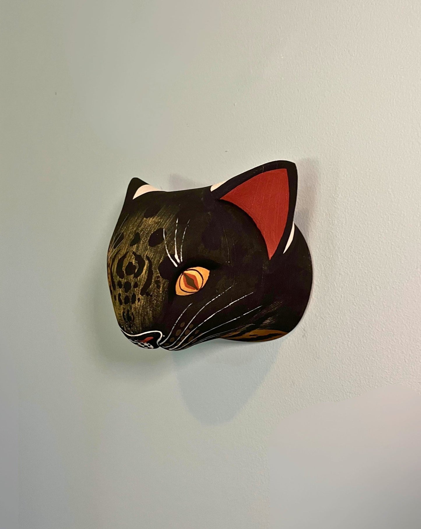 Handmade, hand carved wood, hand painted wooden animal head masks, artifact. One-of-a-kind, unique wall decor, sit-about home décor. Artisan made Chané masks in Argentina. Wild Cat.