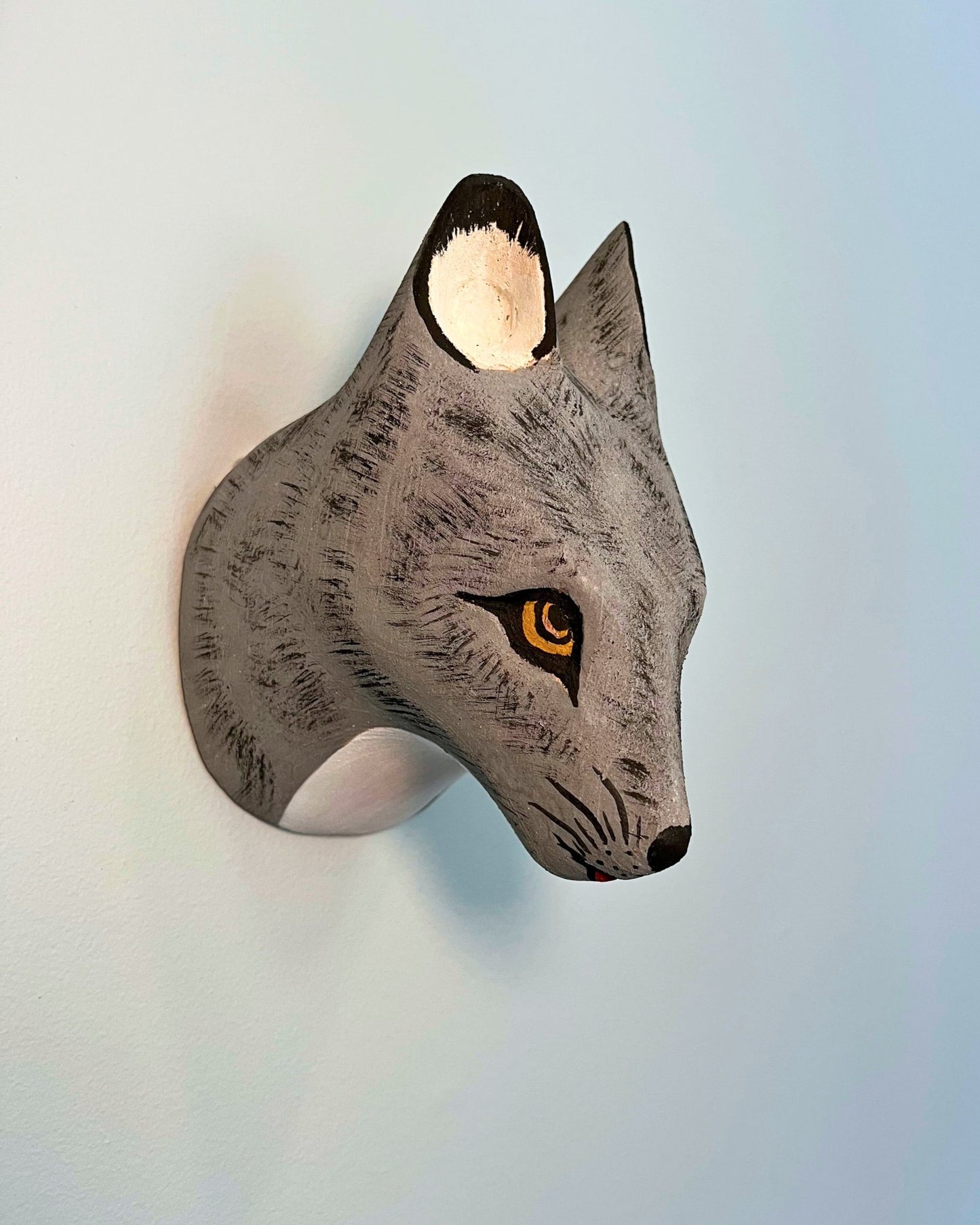 Handmade, hand carved wood, hand painted wooden animal head masks, artifact. One-of-a-kind, unique wall decor, sit-about home décor. Artisan made Chané masks in Argentina. Wolf.