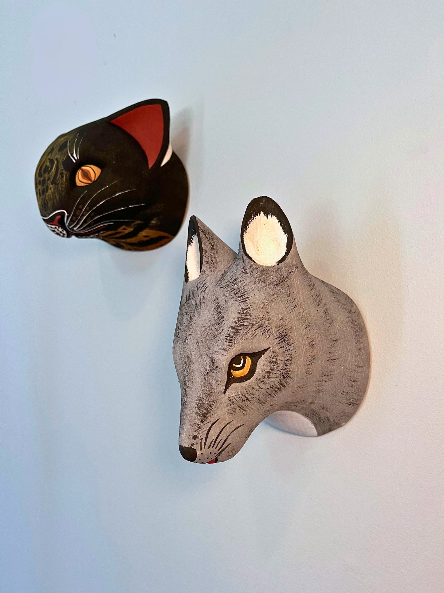 Handmade, hand carved wood, hand painted wooden animal head masks, artifact. One-of-a-kind, unique wall decor, sit-about home décor. Artisan made Chané masks in Argentina. Wolf.