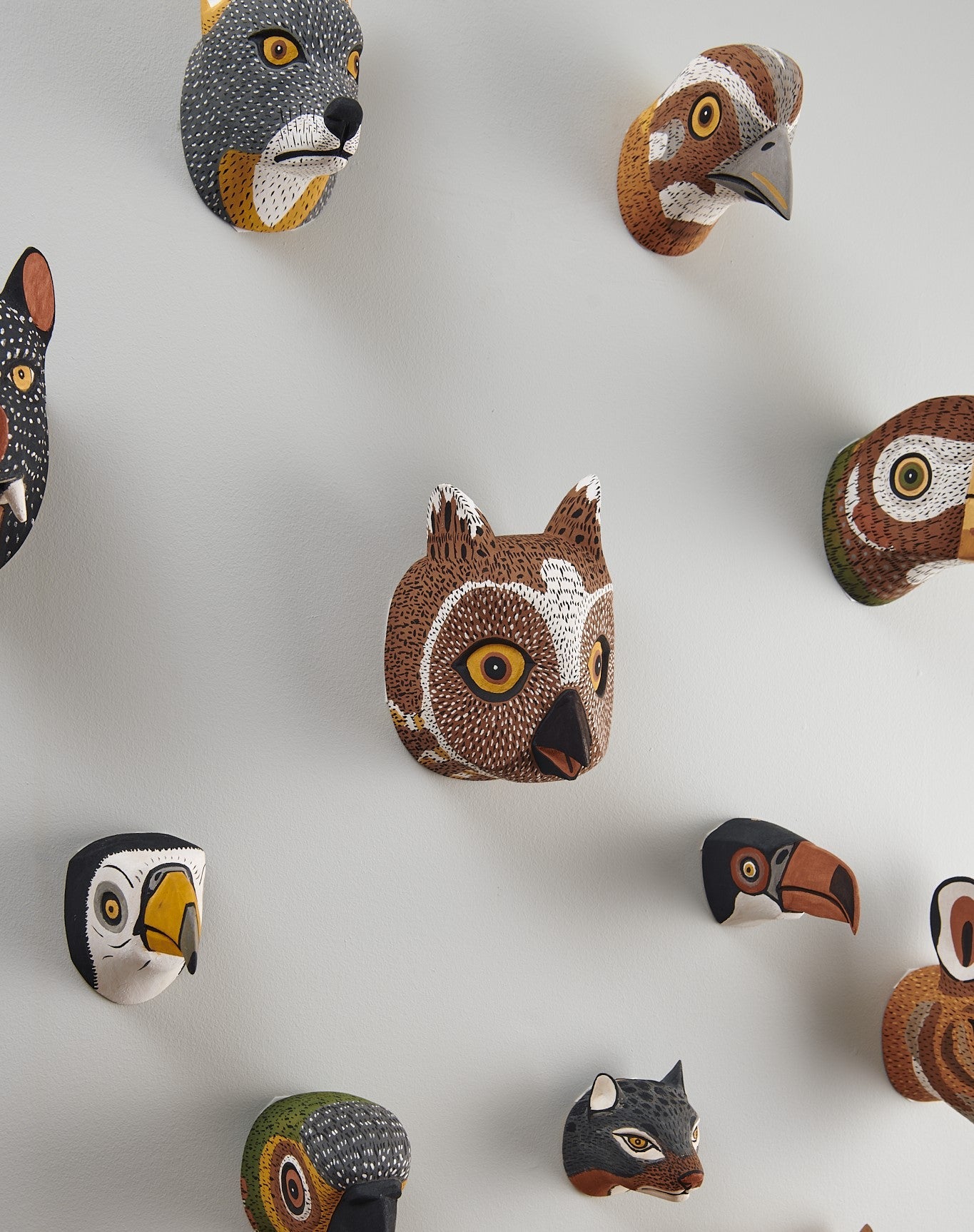 Handmade, hand carved wood, hand painted wooden animal head masks, artifact. One-of-a-kind, unique wall decor, sit-about home décor. Artisan made Chané masks in Argentina. Birds, Owl.