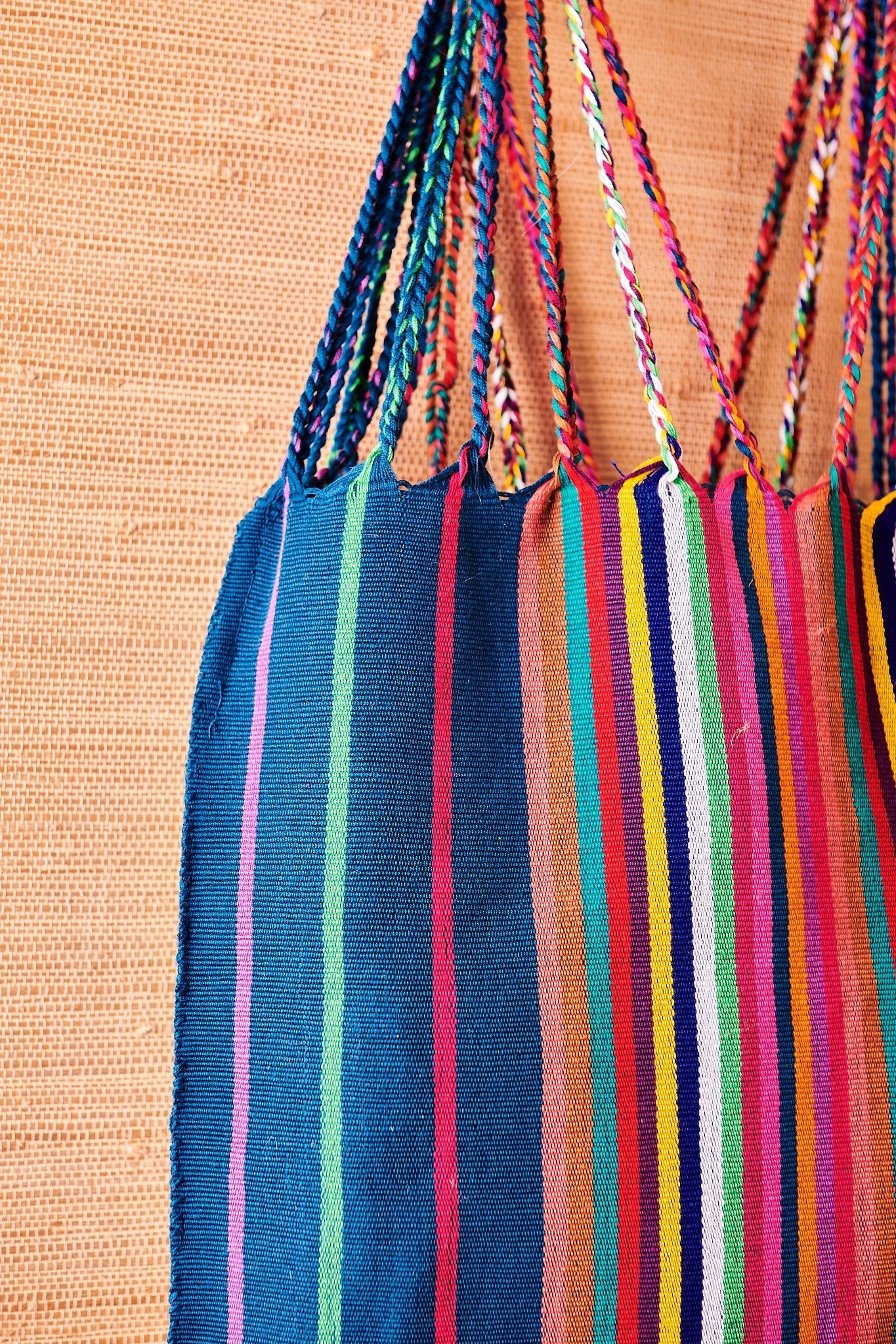 Handwoven Tote Bag is handmade in Mexico out of 100% cotton with bright, fun, colorful materials. Wear to make a unique statement.