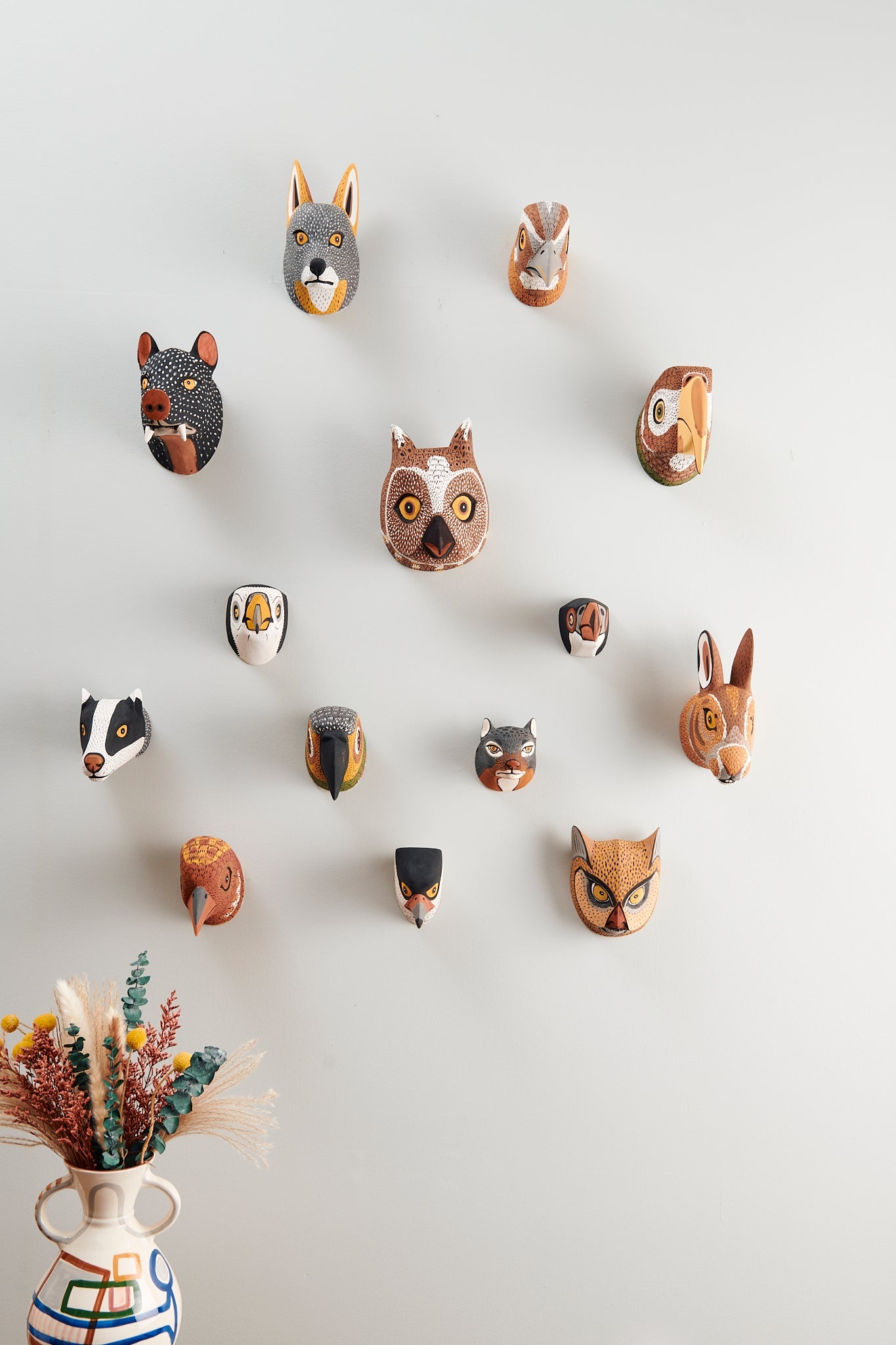 Handmade, hand carved wood, hand painted wooden animal head masks, artifact. One-of-a-kind, unique wall decor, sit-about home décor. Artisan made Chané masks in Argentina. Bird, Owl, Wolf Hog, Rabbit, Parrot