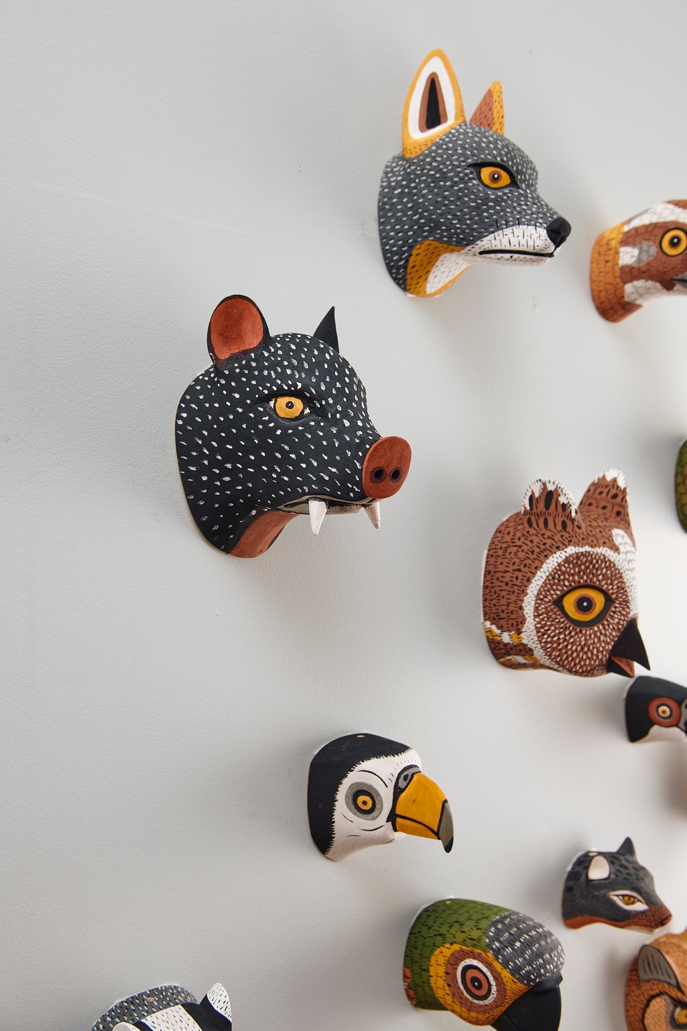 Handmade, hand carved wood, hand painted wooden animal head masks, artifact. One-of-a-kind, unique wall decor, sit-about home décor. Artisan made Chané masks in Argentina. Hog, Pig, Wolf, Owl, Bird