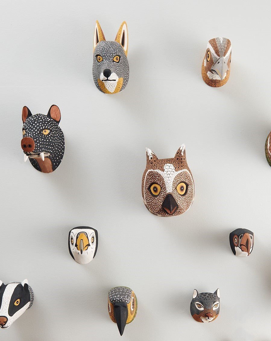 Handmade, hand carved wood, hand painted wooden animal head masks, artifact. One-of-a-kind, unique wall decor, sit-about home décor. Artisan made Chané masks in Argentina. Wolf, Owl, Hog, Birds.
