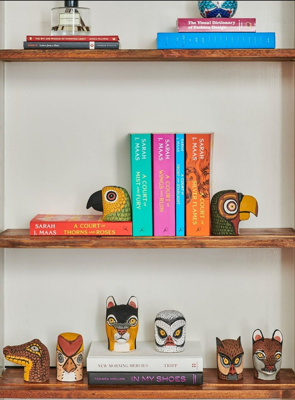 Handmade, hand carved wood, hand painted wooden animal heads. One-of-a-kind, unique tabletop decor, sit-about home décor. Artisan made from Chané artisans in Argentina. Bookshelf decor, display. Bookends.