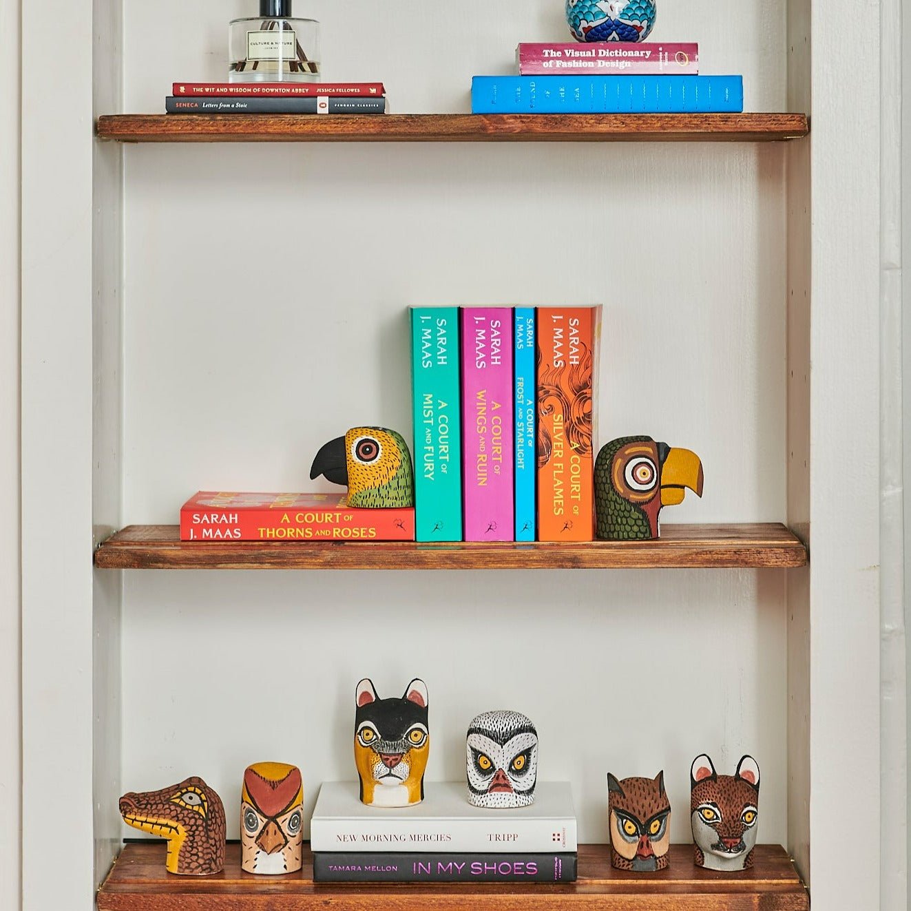 Handmade, hand carved wood, hand painted wooden animal heads. One-of-a-kind, unique tabletop decor, sit-about home décor. Artisan made from Chané artisans in Argentina. Bookshelf decor, display. Bookends.