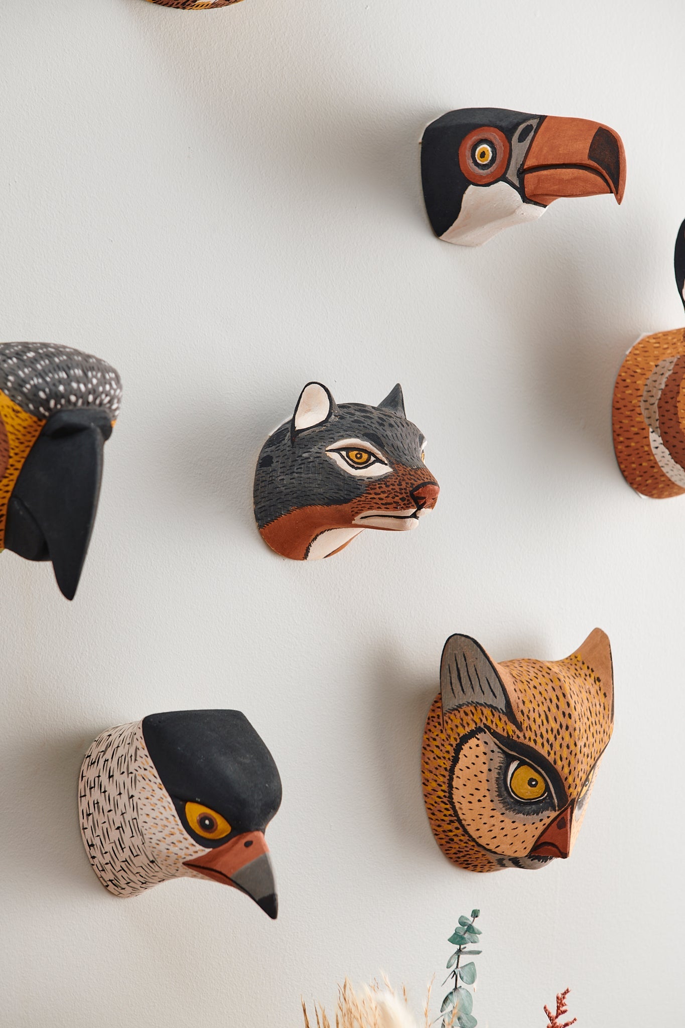 Handmade, hand carved wood, hand painted wooden animal head masks, artifact. One-of-a-kind, unique wall decor, sit-about home décor. Artisan made Chané masks in Argentina. Bird, Owl, Toucan, Hawk.