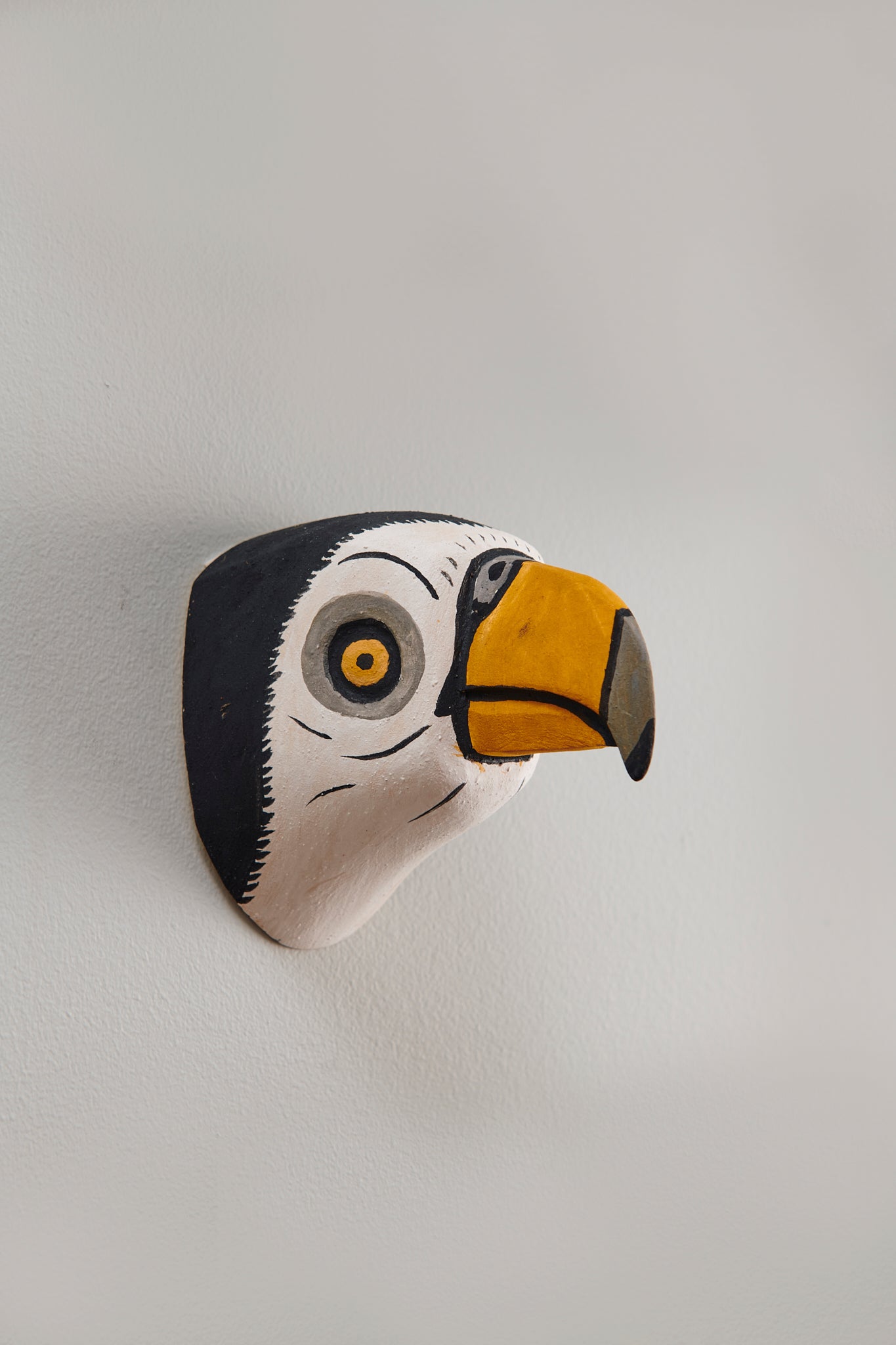Handmade, hand carved wood, hand painted wooden animal head masks, artifact. One-of-a-kind, unique wall decor, sit-about home décor. Artisan made Chané mask in Argentina. Parrot, Bird.