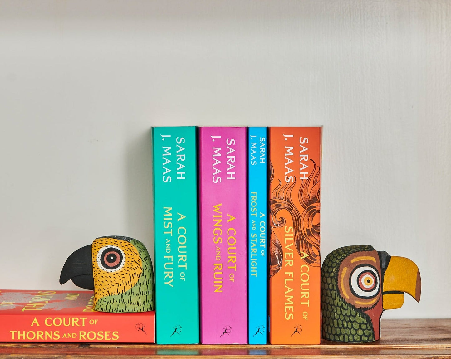 Handmade, hand carved wood, hand painted wooden animal heads. One-of-a-kind, unique tabletop decor, sit-about home décor. Artisan made from Chané artisans in Argentina. Parrot.