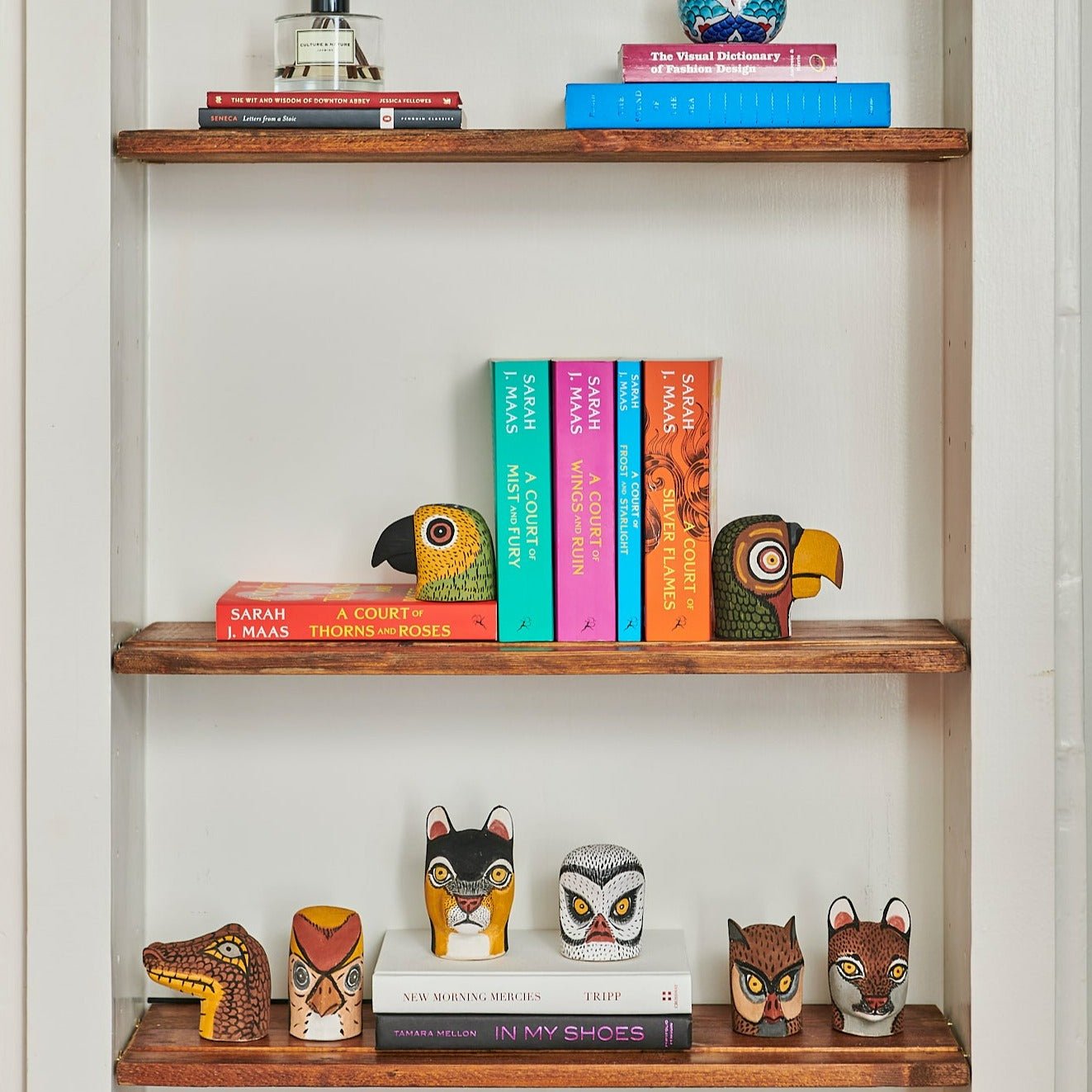 Handmade, hand carved wood, hand painted wooden animal heads. One-of-a-kind, unique tabletop decor, sit-about home décor. Artisan made from Chané artisans in Argentina. Bookshelf decor, bookends.