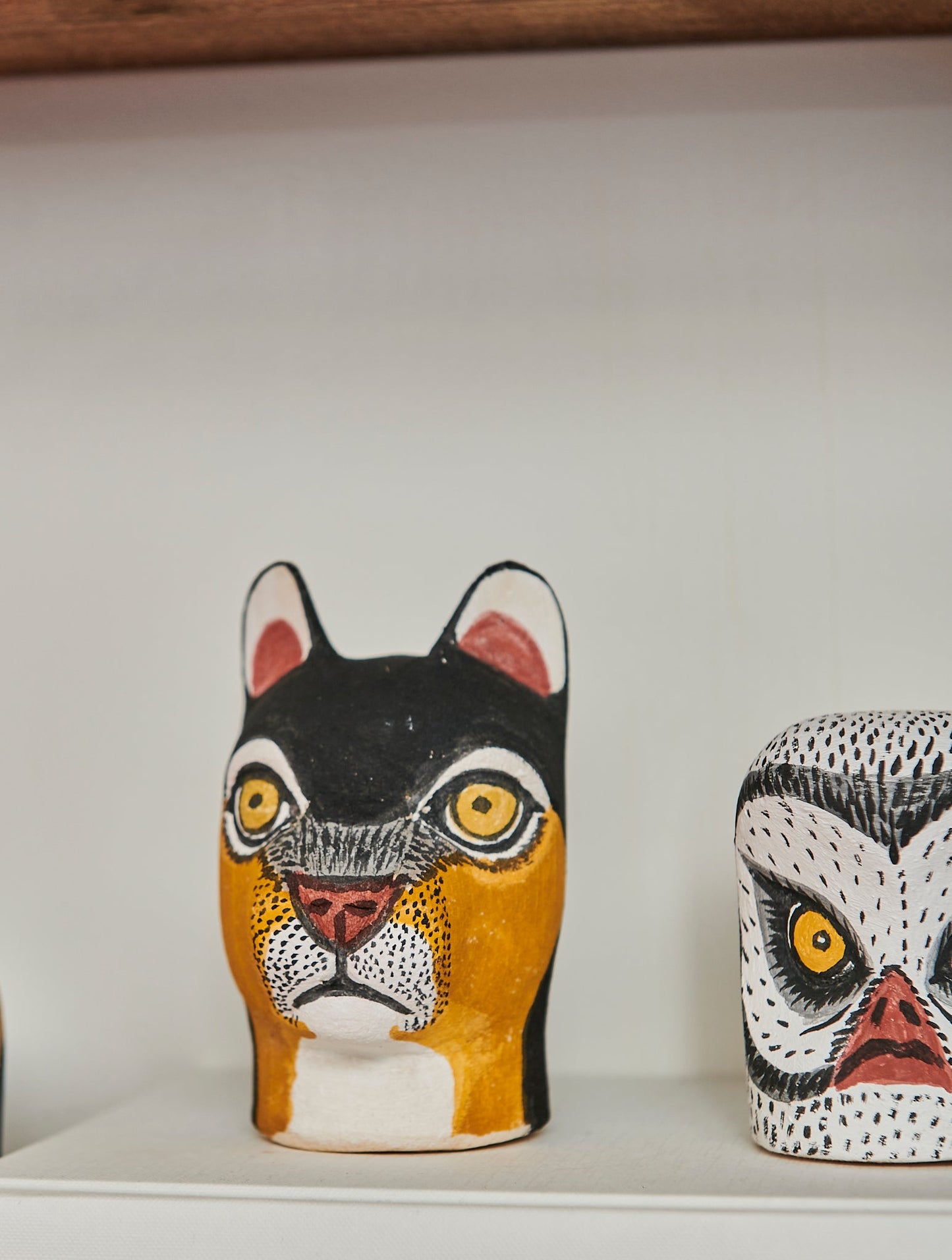 Handmade, hand carved wood, hand painted wooden animal heads. One-of-a-kind, unique tabletop decor, sit-about home décor. Artisan made from Chané artisans in Argentina. Wild Cat.