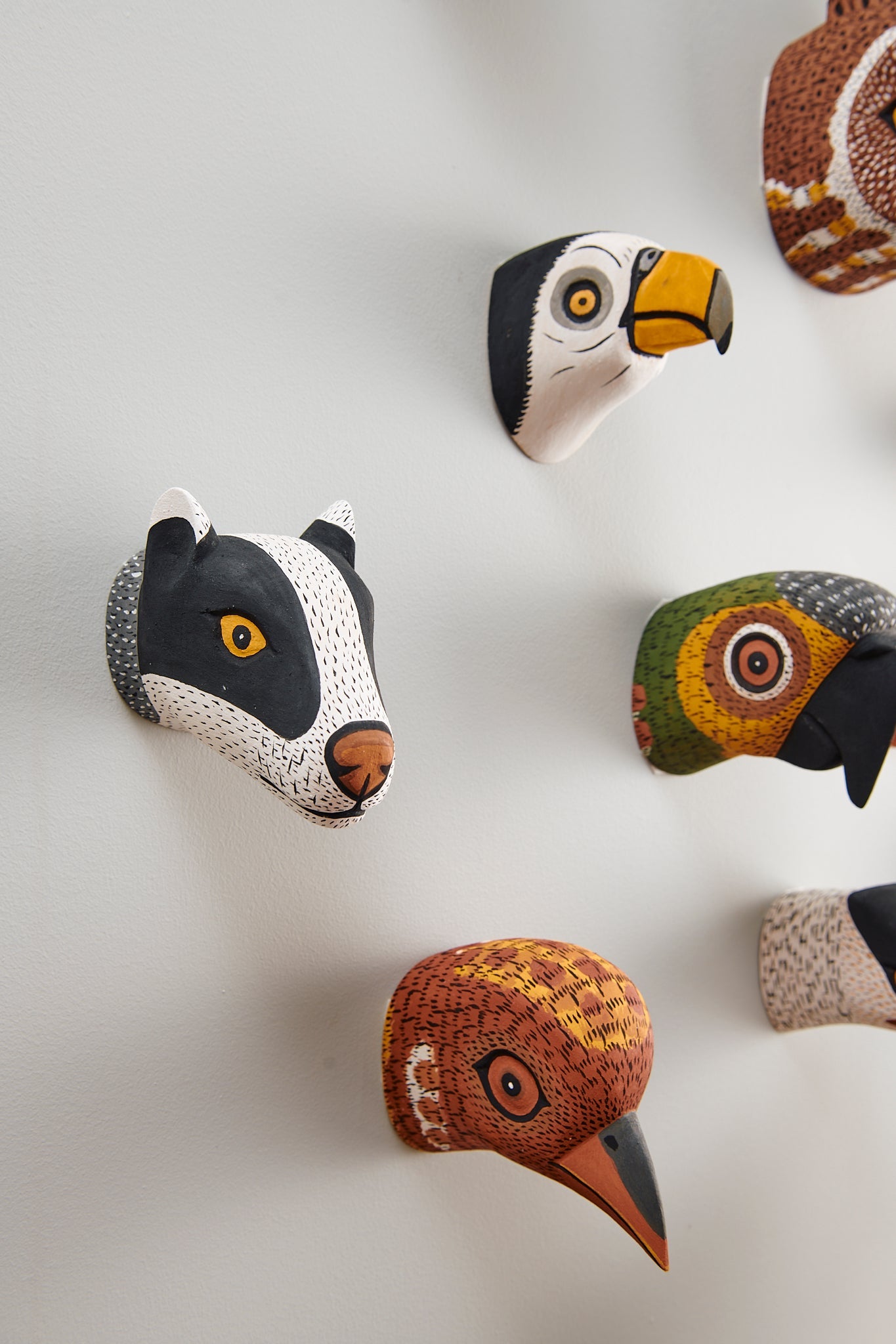 Handmade, hand carved wood, hand painted wooden animal head masks, artifact. One-of-a-kind, unique wall decor, sit-about home décor. Artisan made Chané masks in Argentina. Bird, Wild Dog, Parrot