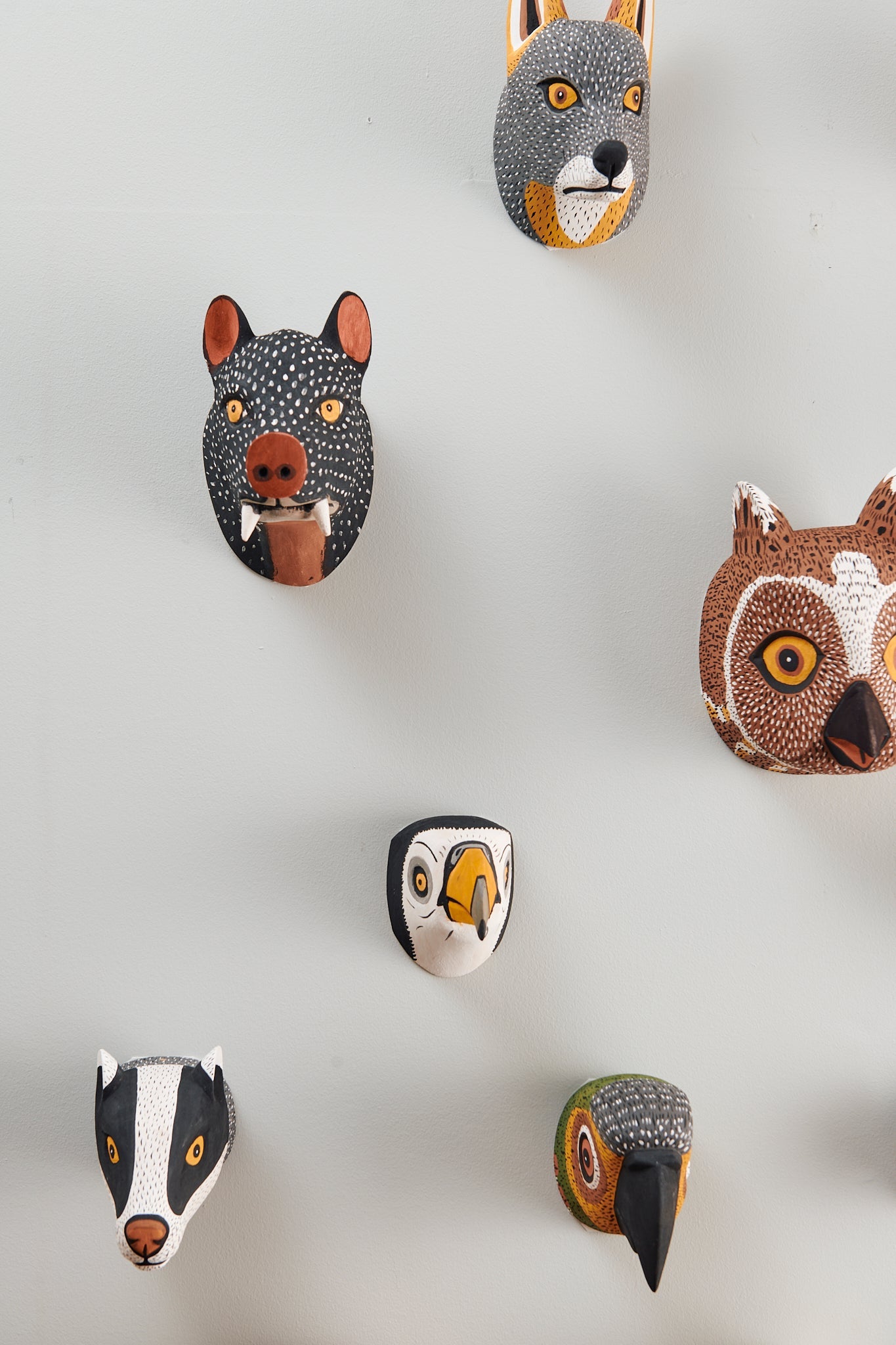 Handmade, hand carved wood, hand painted wooden animal head masks, artifact. One-of-a-kind, unique wall decor, sit-about home décor. Artisan made Chané masks in Argentina. Bird, Dog, Parrot, Owl, Hog, Wolf.