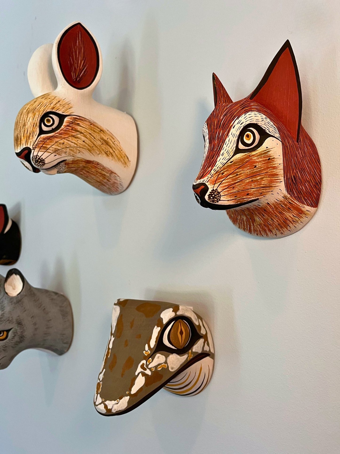 Handmade, hand carved wood, hand painted wooden animal head masks, artifact. One-of-a-kind, unique wall decor, sit-about home décor. Artisan made Chané masks in Argentina. Rabbit hare.
