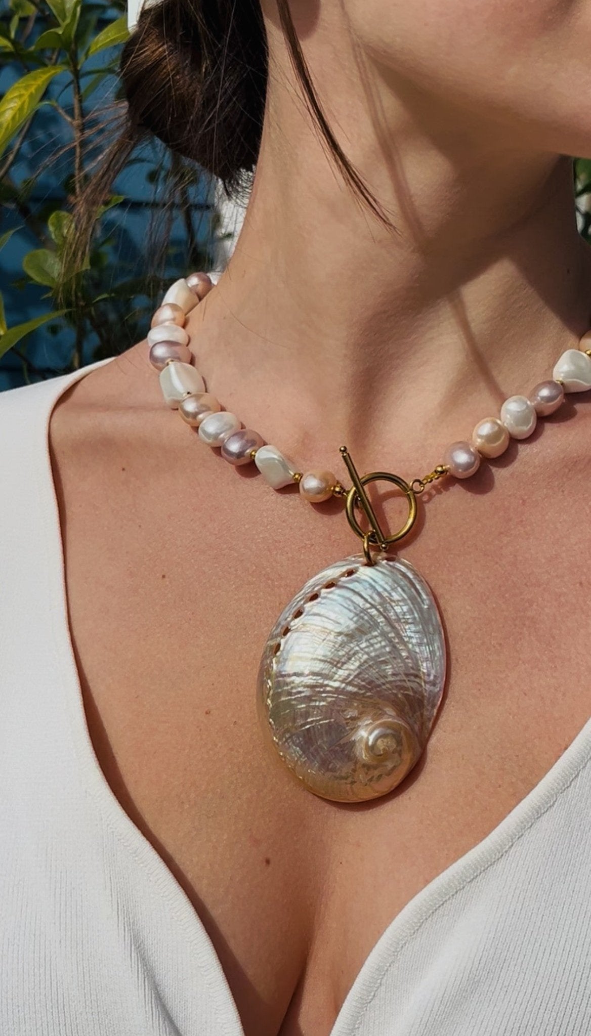 White seashell necklace handmade in Greece with Mother of Pearl beads and large natural shell pendant. 24k gold plated accessories. Beach, Resort, luxury natural jewelry. Mermaid shell jewelry. Boho bridal jewelry, mermaid necklace, aesthetic jewelry