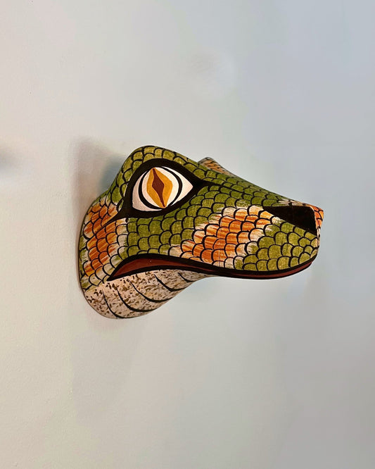 Handmade, hand carved wood, hand painted wooden animal head masks, artifact. One-of-a-kind, unique wall decor, sit-about home décor. Artisan made Chané masks in Argentina. Snake, Lizard.
