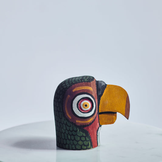 Handmade, hand carved wood, hand painted wooden animal heads.  One-of-a-kind, unique tabletop decor, sit-about home décor. Artisan made from Chané artisans in Argentina. Parrot.