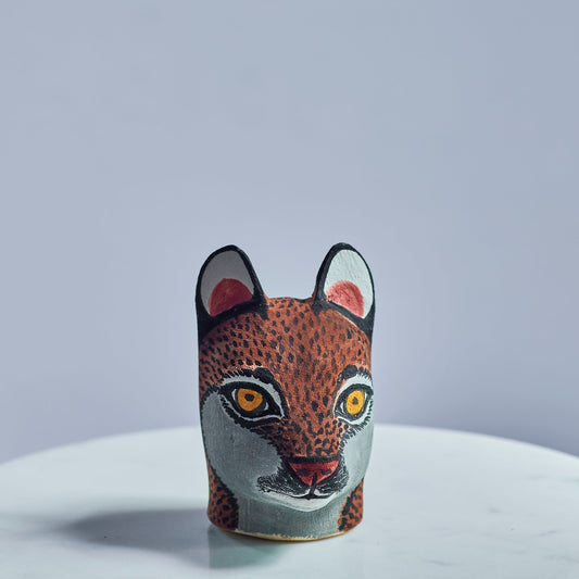 Handmade, hand carved wood, hand painted wooden animal heads.  One-of-a-kind, unique tabletop decor, sit-about home décor. Artisan made from Chané artisans in Argentina. Wolf.